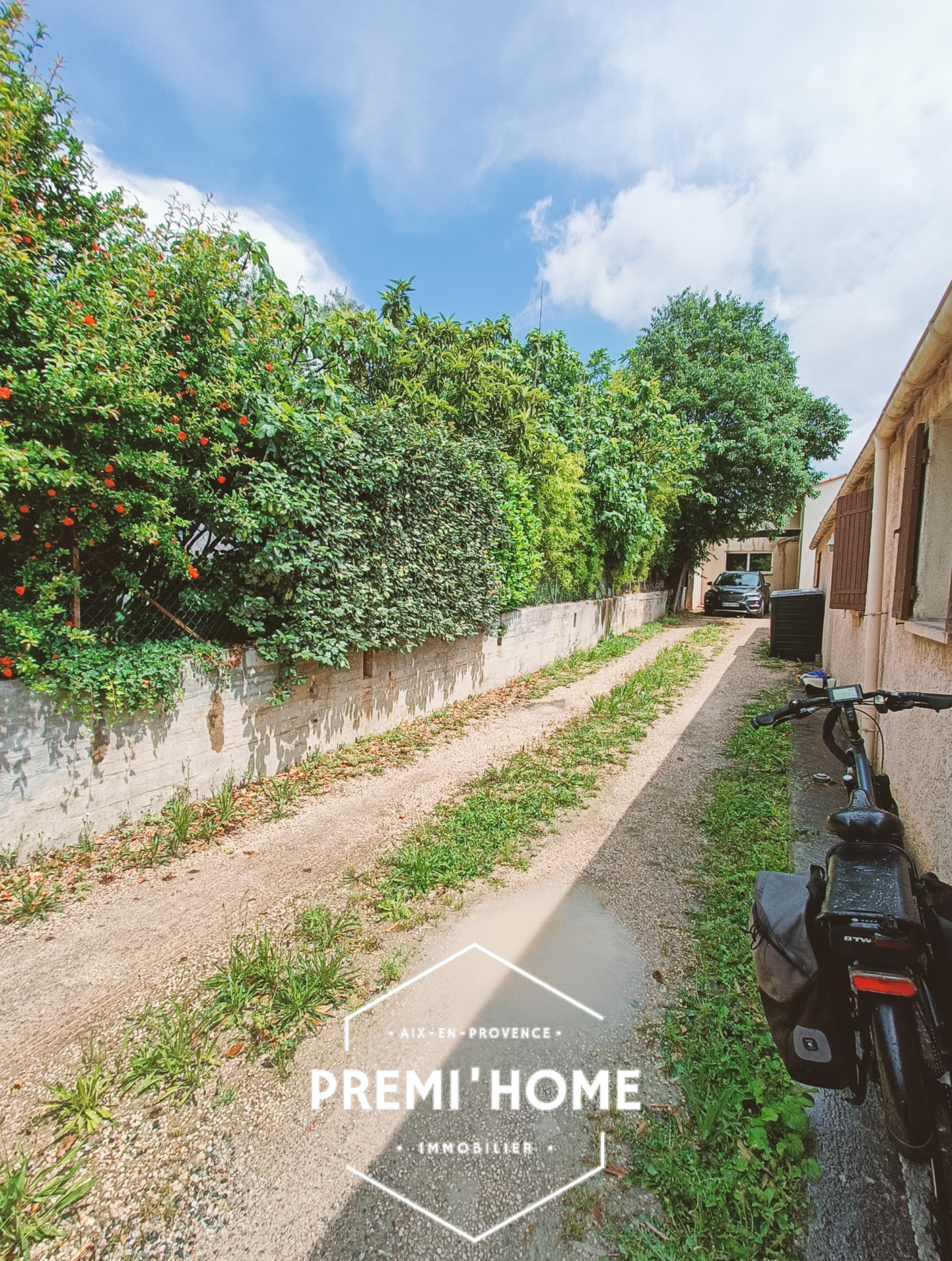 T3 REZ DE JARDIN MAISON, AVEC TERRASSE ET PARKING CENTRE LUY - Premi'home Agence immobilière Aix En Provence
